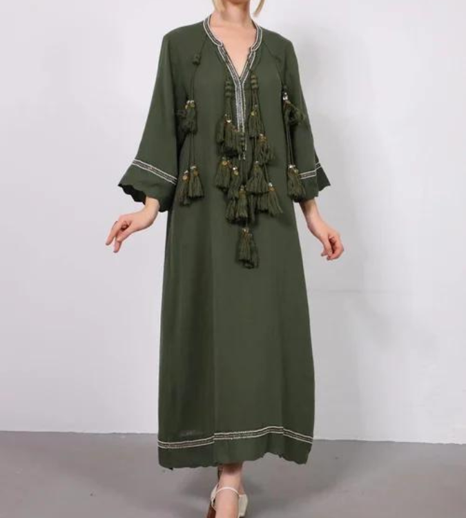 Women's dress decorated with tassels in olive color